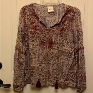 Long sleeve light weight rayon blouse with tassled